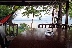 Balcony with table and hammock